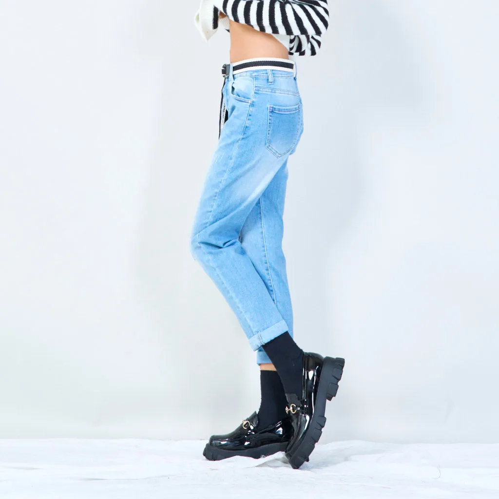 Distressed jeans with statement belt wholesale